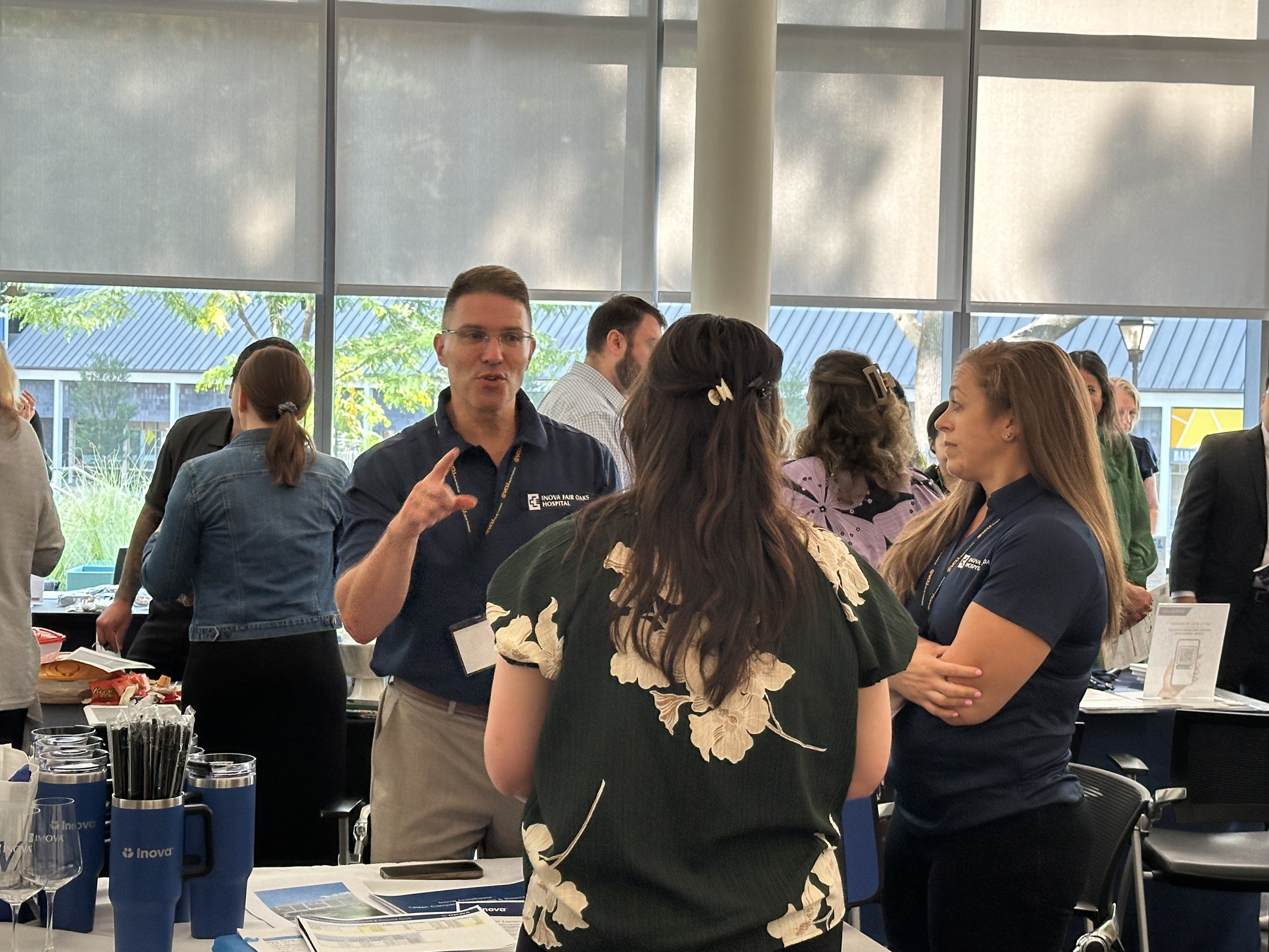 Students listening to a table talk during professional development day.